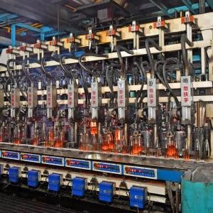 The production process of glass bottles and jars