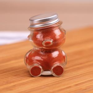 Tilted head bear shaped glass jar